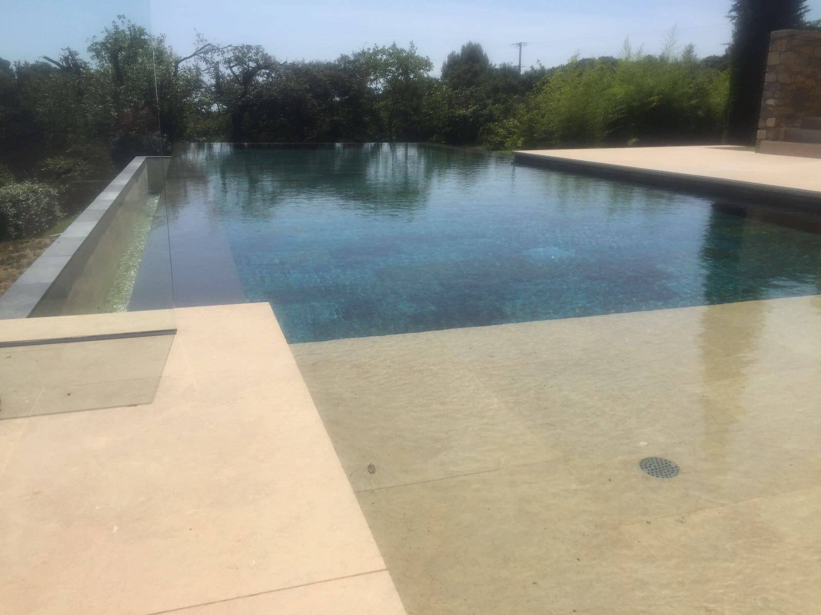 Beige natural stone paving