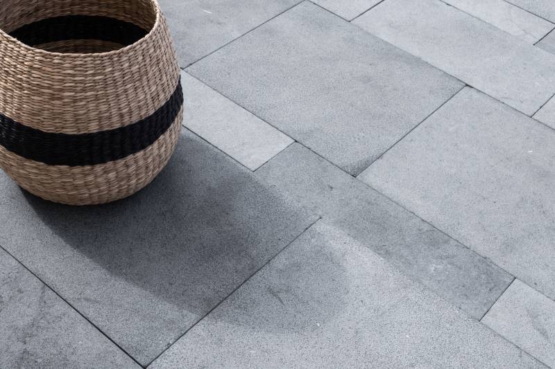 Paving for flooring in natural Atlas beige and gray Limestone with aged finish next to Miami, Florida.