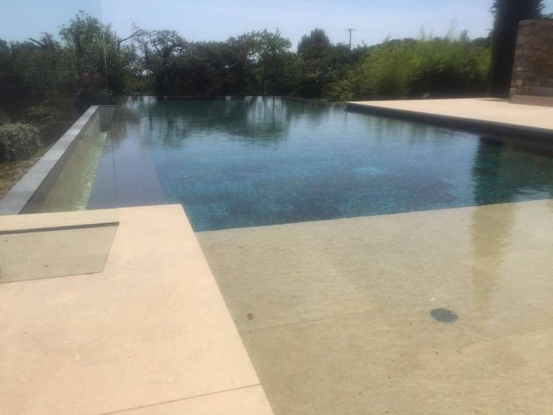 Beige natural stone paving