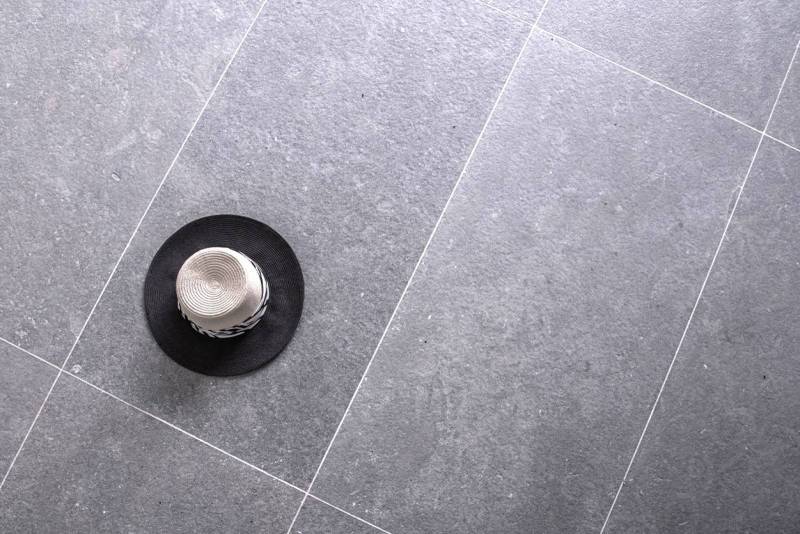 Stunning terrace flooring and poolside edging in natural Kahla Grey stone from the Atlas Mountains