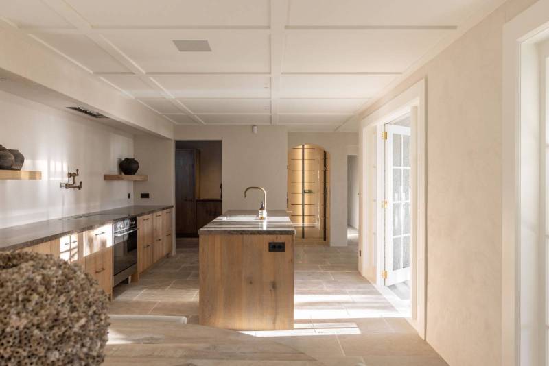 Gray natural stone slabs from the Atlas in Morocco for interior flooring in an antique aged finish for a rustic but minimalist home