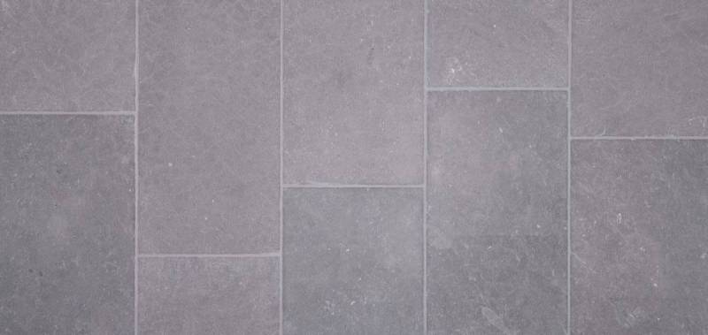 Kahla grey natural stone in antique aged finish in Marrakech: slabs in free length and multiple widths for outdoor terraces