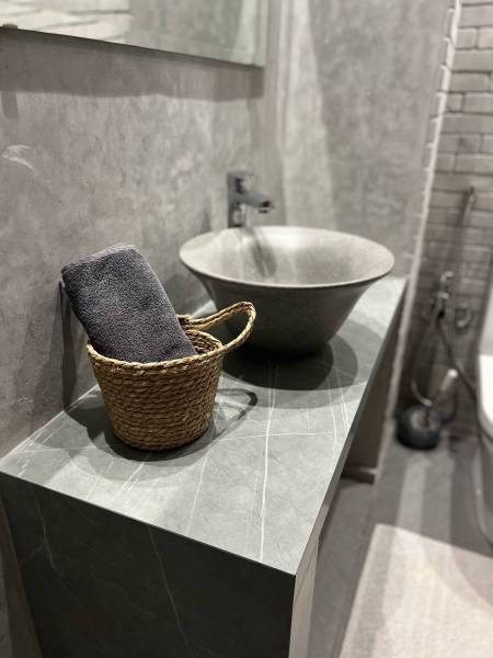 Rustic grey natural stone bricks with elegant cut-in basin