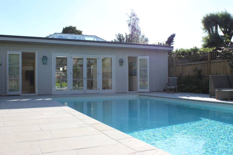 Classic pool copings in Chablis beige natural limestone in antique aged finish rounded edge