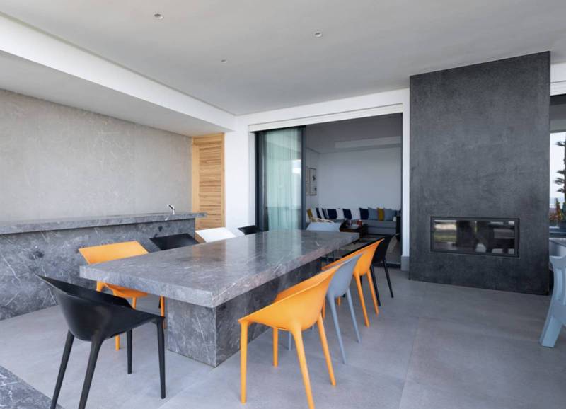 Beach house in Skhirat Morocco Table covering and garden kitchen in ultra-resistant white veined grey marble with a matt brushed finish