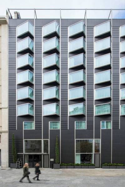 Modern Minimalist Facade in Bauhaus Style by our marble company in morocco available in Montreal, Canada