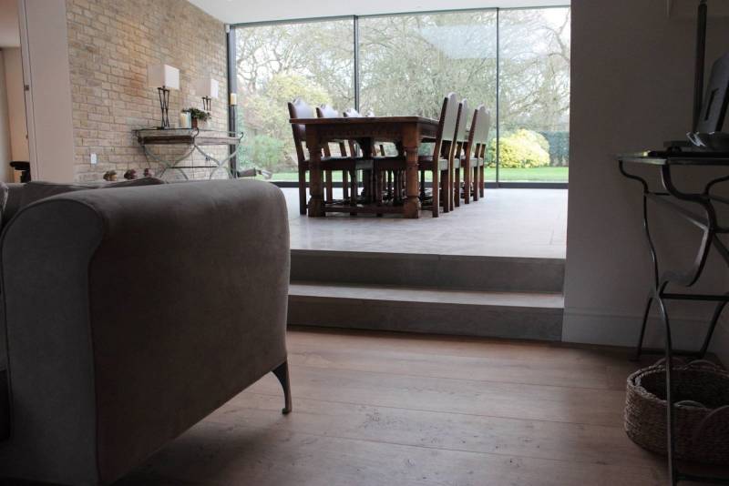 Stone cladding for sale. Buy stone slabs for flooring at great deal, just like in this Montreal architect's house in Canada