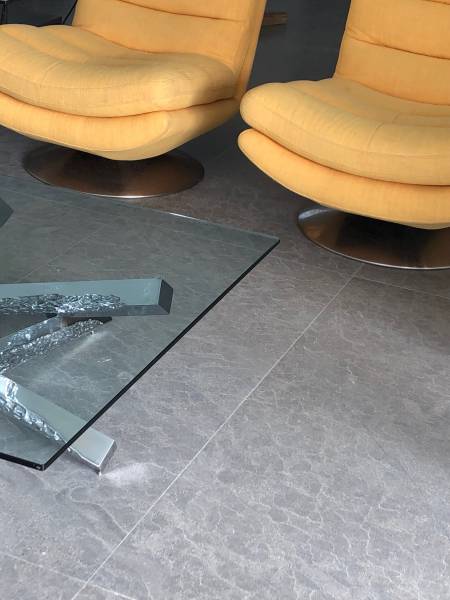 Buy giant slabs in a monoformat of natural limestone as flooring for your chic and modern interior. This Bel Air house in Los Angeles, California used our gray stone as floor cladding for living space