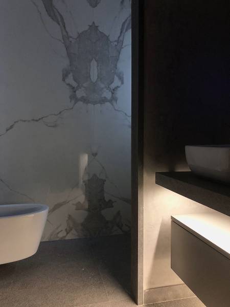 Modern bathroom in a stone cladding providing a timeless look at affordable price in Miami Florida