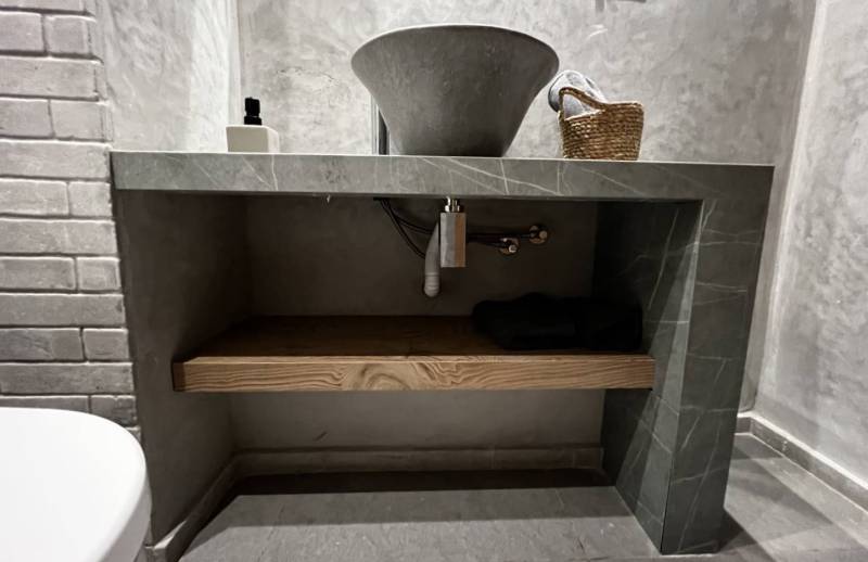 Buy bathroom counter cladding material and custom stone sink at low price. Check out bathroom in Bel Air, Los Angeles, California